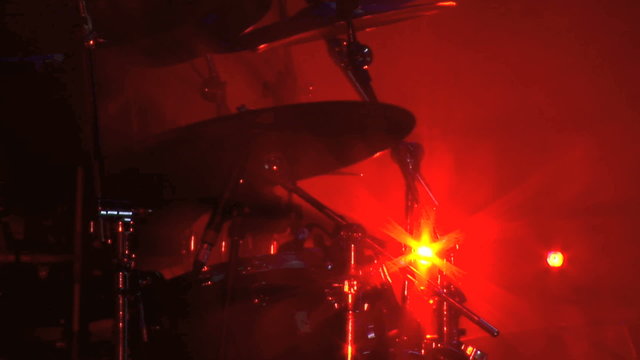 Cymbals being played by rock drummer