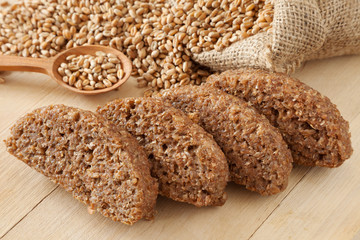 bread slices from wheat sprouts and seeds in hessian bag