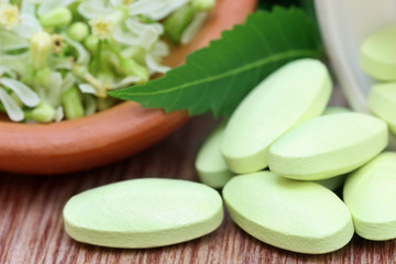Herbal pills made by neem leaves and flower