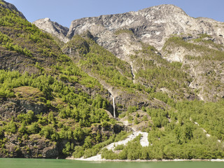 Fototapeta na wymiar Naeroyfjord, Fjord, Wasserfall, Küste, Laerdal, Norwegen