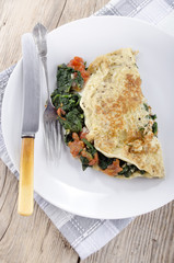 omelette with spinach and tomatoes