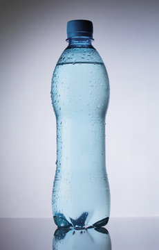 Bottle of pure water drops