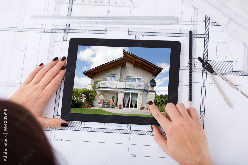 Aufkleber architect with digital tablet and blueprint