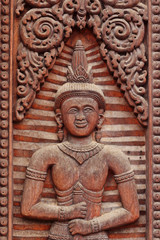 Obraz premium thai wood carving on the door temple
