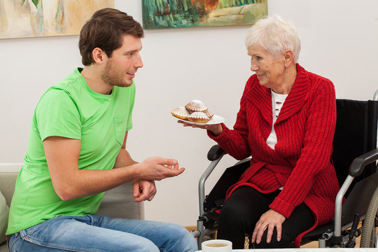 Man Visiting His Disabled Aunt