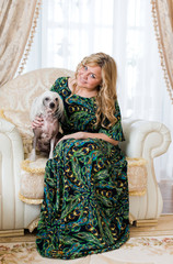 Woman keeping Chinese crested dog