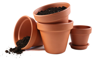 Clay flower pots and soil, isolated on white