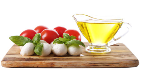 Composition with tasty mozzarella cheese balls, basil and red