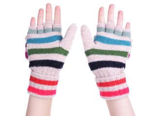 Female hands in mittens isolated on white