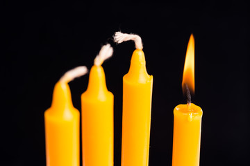 A candle is ligt up,Concept of be different.