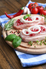 Raw meat steak with herbs and spices