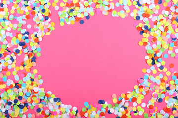 Confetti on pink background