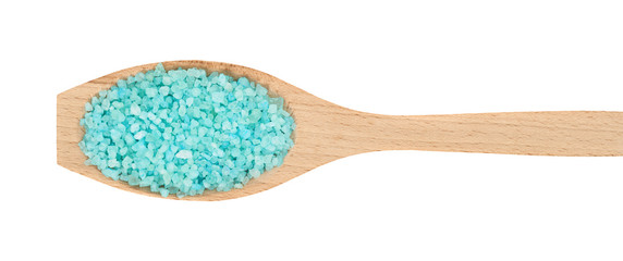 Wooden spoon full of salt crystals
