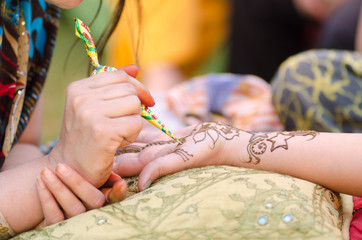 applying henna on hand, wedding ,Rajasthan, India