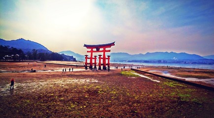 Big red gate (Torii) at Miyajima island, Hiroshima, Japan