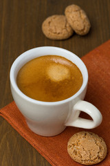 cup of espresso and biscotti, selective focus