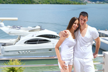 young couple on yacht