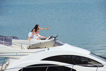 young couple on yacht