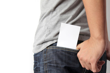 Blank card with copy space in a pocket of jeans.