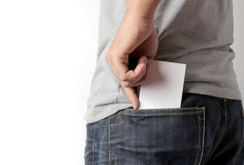Closeup man pulling a card on his back pocket