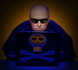 Dangerous hacker with laptop.