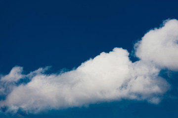 Obraz premium Set of white clouds over blue
