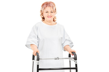 Female patient walking with walker