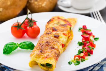 Omelet with vegetables and herbs