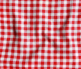 Texture of a red and white checkered picnic blanket.