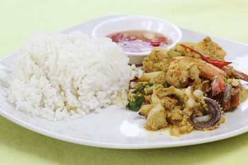 Seafood yellow curry powder stir Fried with steam rice