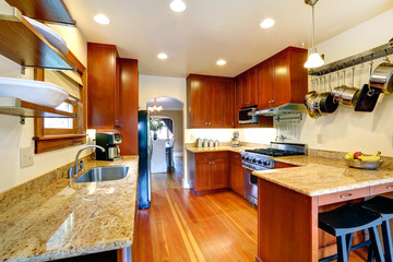 Kitchen room with archway to dining area