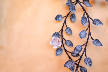 Orange background with steel rose