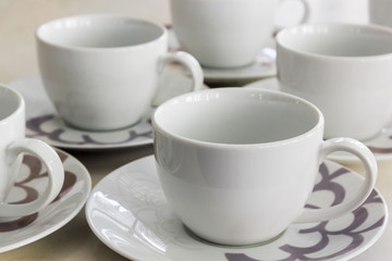 Empty cups lined up in a row.