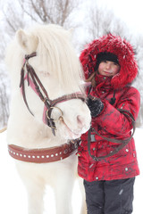 Obraz na płótnie Canvas Child and horse