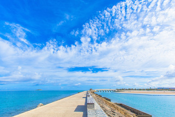 Fototapeta premium Breakwater road with benches