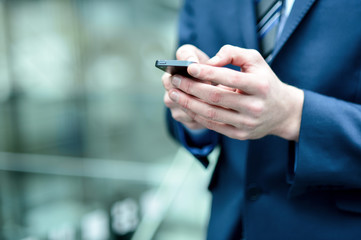 Close up of a man using mobile phone