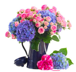 bouquet of fresh pink roses and blue hortensia flowers