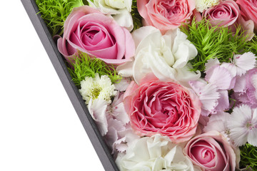 Partial view of a box filled with flowers