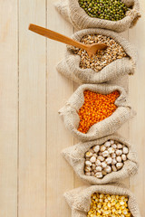 hessian bags with peas, chick peas, red lentils, wheat and green