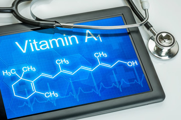 Tablet mit der chemischen Strukturformel von Vitamin A