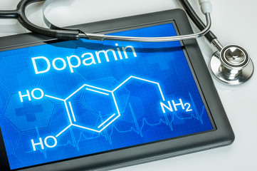 Tablet mit der chemischen Strukturformel von Dopamin