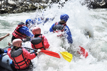 Rafting, splashing the white water