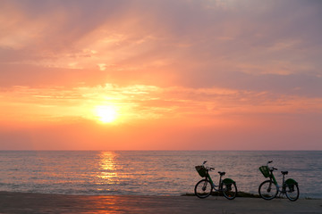 Fototapeta na wymiar Two bicycles on Batumi beach