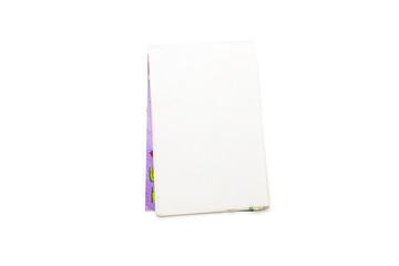 blank open note pad with purple cover, isolated on white