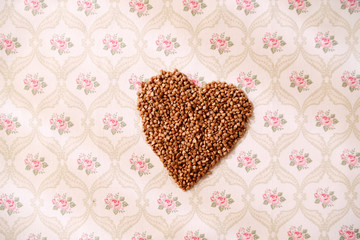 Heart shaped buckwheat cereals on a serviette