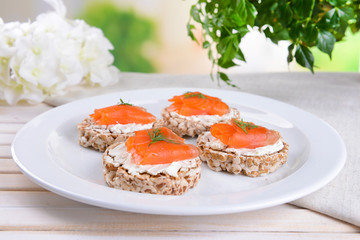 Delicious canapes on table close-up