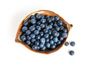 Blueberry in bowl on white