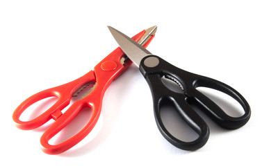 Red and black closed scissors