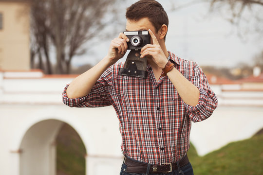 Hipster Guy In The Street With Old Camera