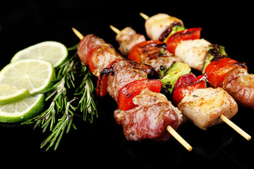 Pork kebab on black background